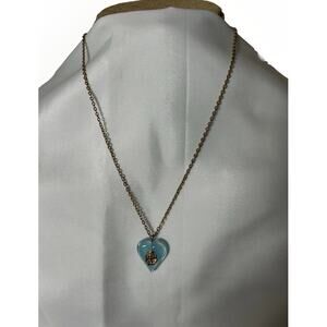 Lovely Vtg Gold Tone Blue Acrylic USN Heart Necklace. Measures 20”
